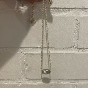 Kendra Scott necklace.